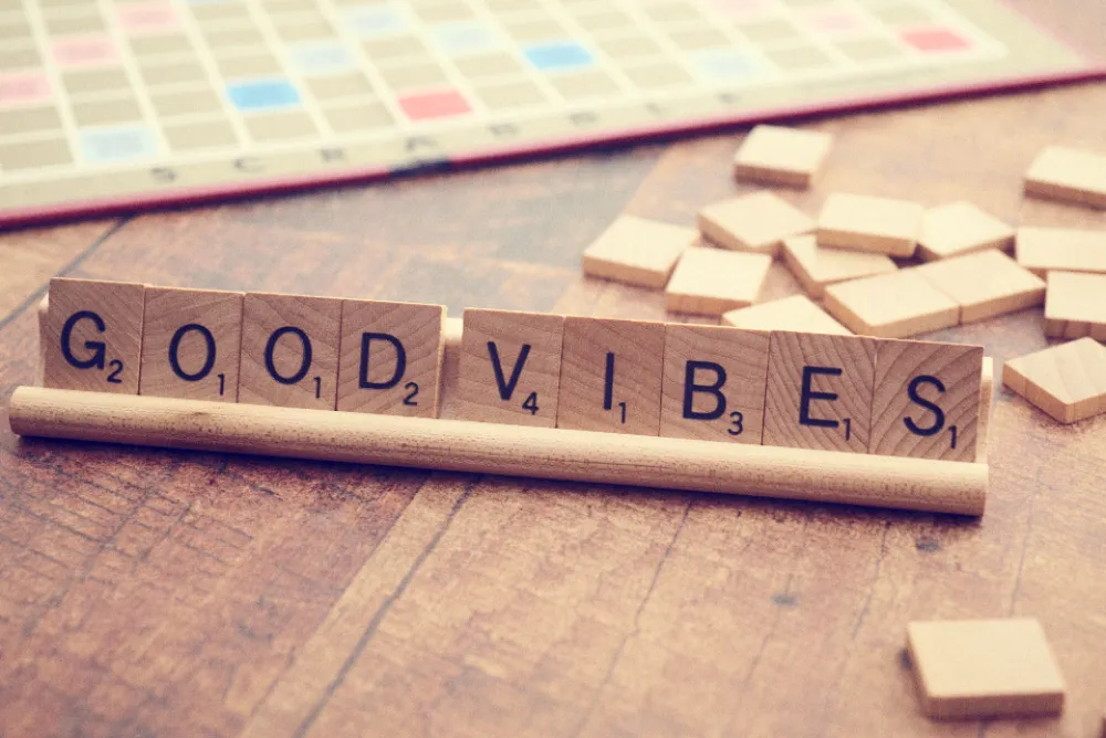 Letter tiles spelling words, representing the language work behind translating documents to and from Korean